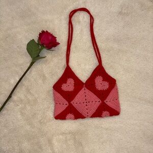Handmade crocheted heart granny square shoulder bag.